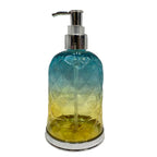 Gradient blue to yellow soap dispenser on a textured white background